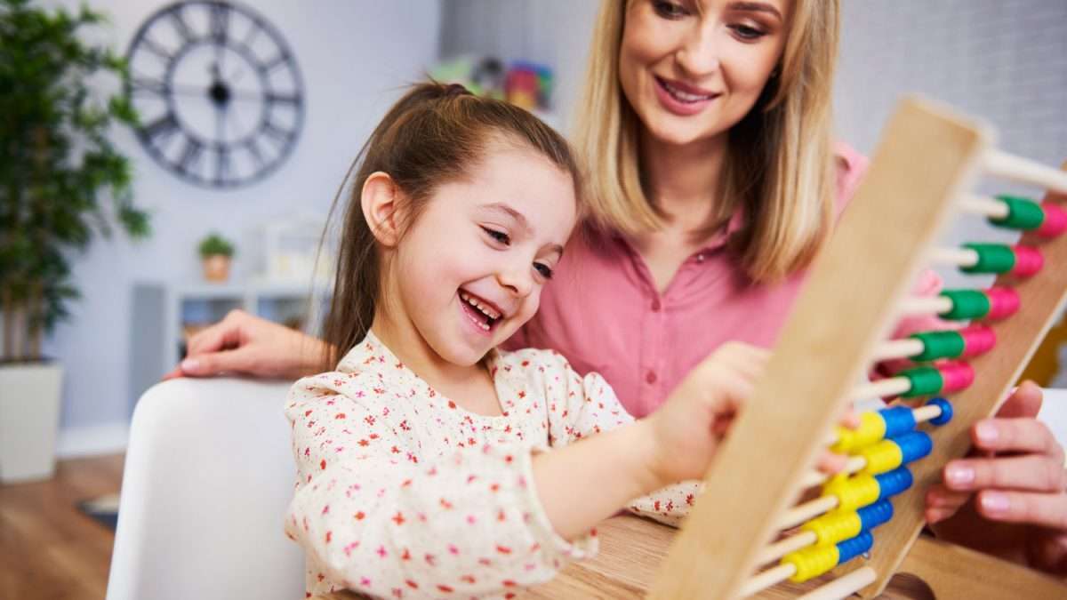 mother enjoying abacus with child